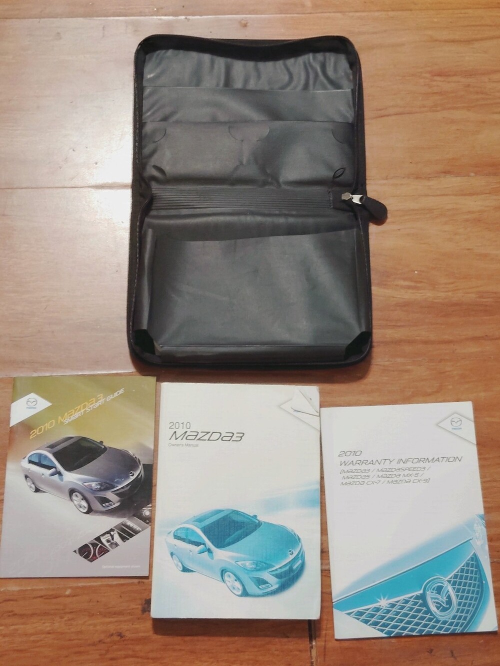 2010 Mazda 3 Owners Manual Set With Case OEM